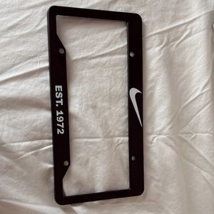 Nike Black License Plate Frame with White Swoosh and EST. 1972